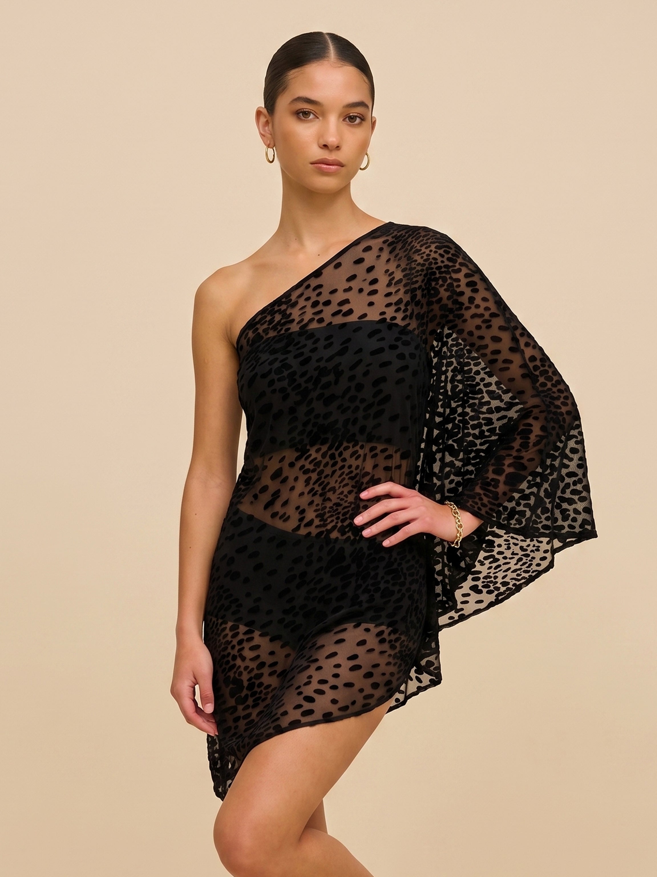Black Sheer Asymmetric Top in Velvet Flocked Tulle. One-Shoulder, Cape Sleeve
