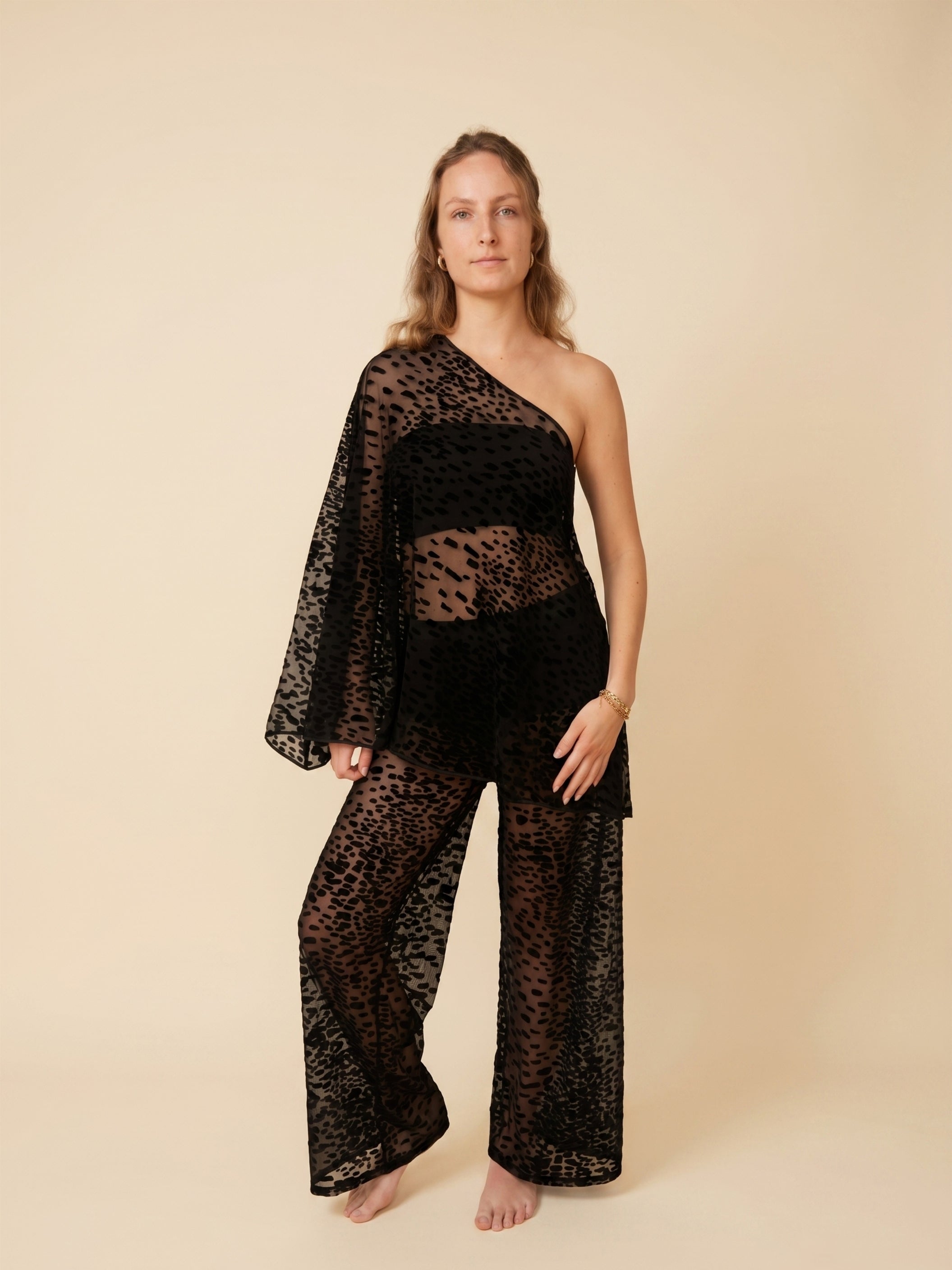 Black Sheer Asymmetric Top in Velvet Flocked Tulle. One-Shoulder, Cape Sleeve