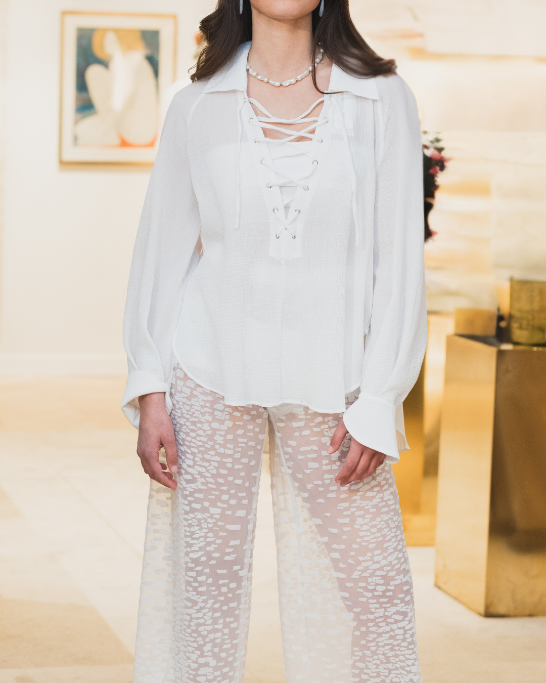 Lumey Paris 11.14 white flocked tulle trousers worn with a lace-up blouse and Tourny pearl choker, Rainbow Bordeaux