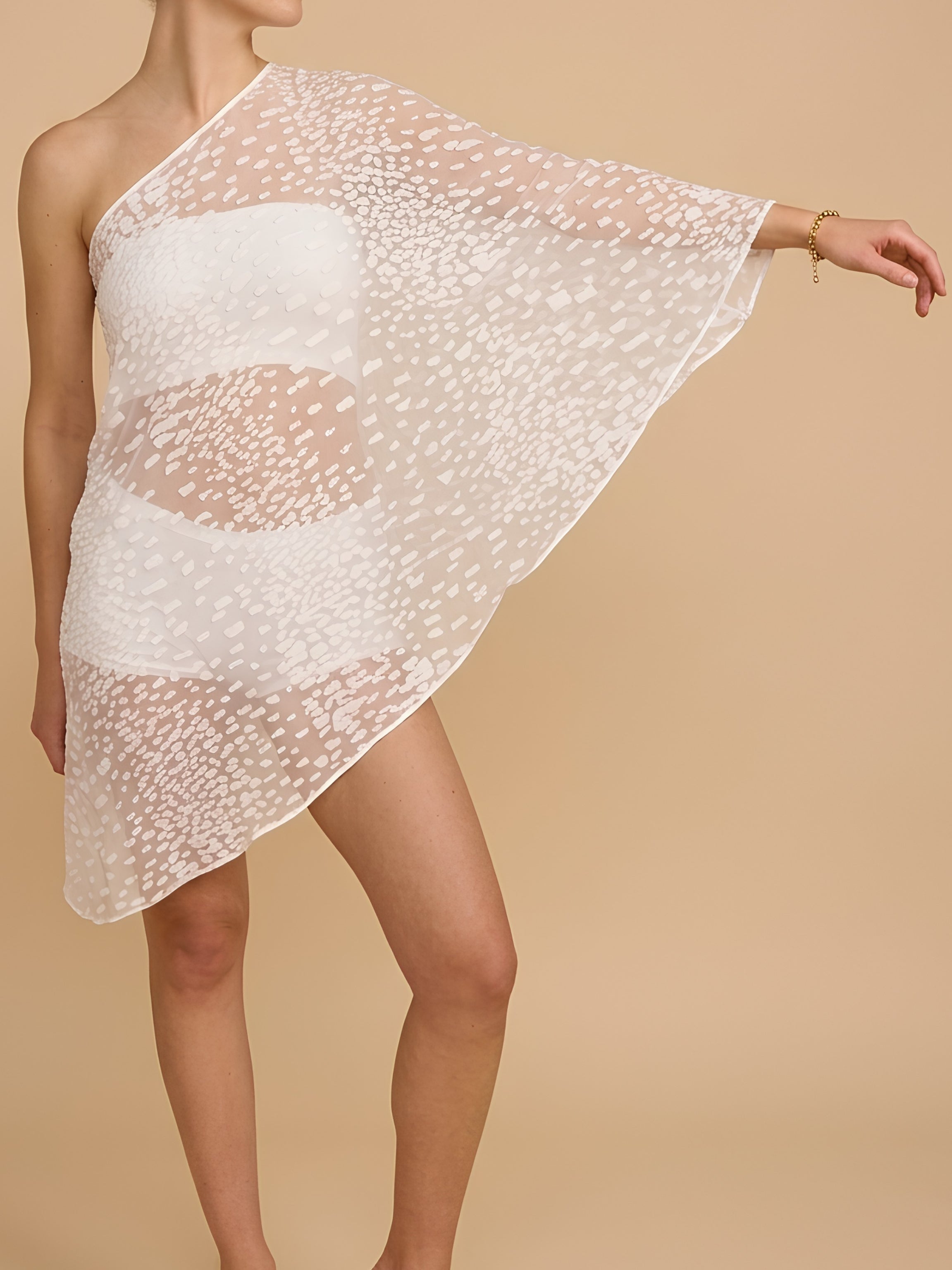 White Sheer Asymmetric Top in Velvet Flocked Tulle. One-Shoulder, Cape Sleeve